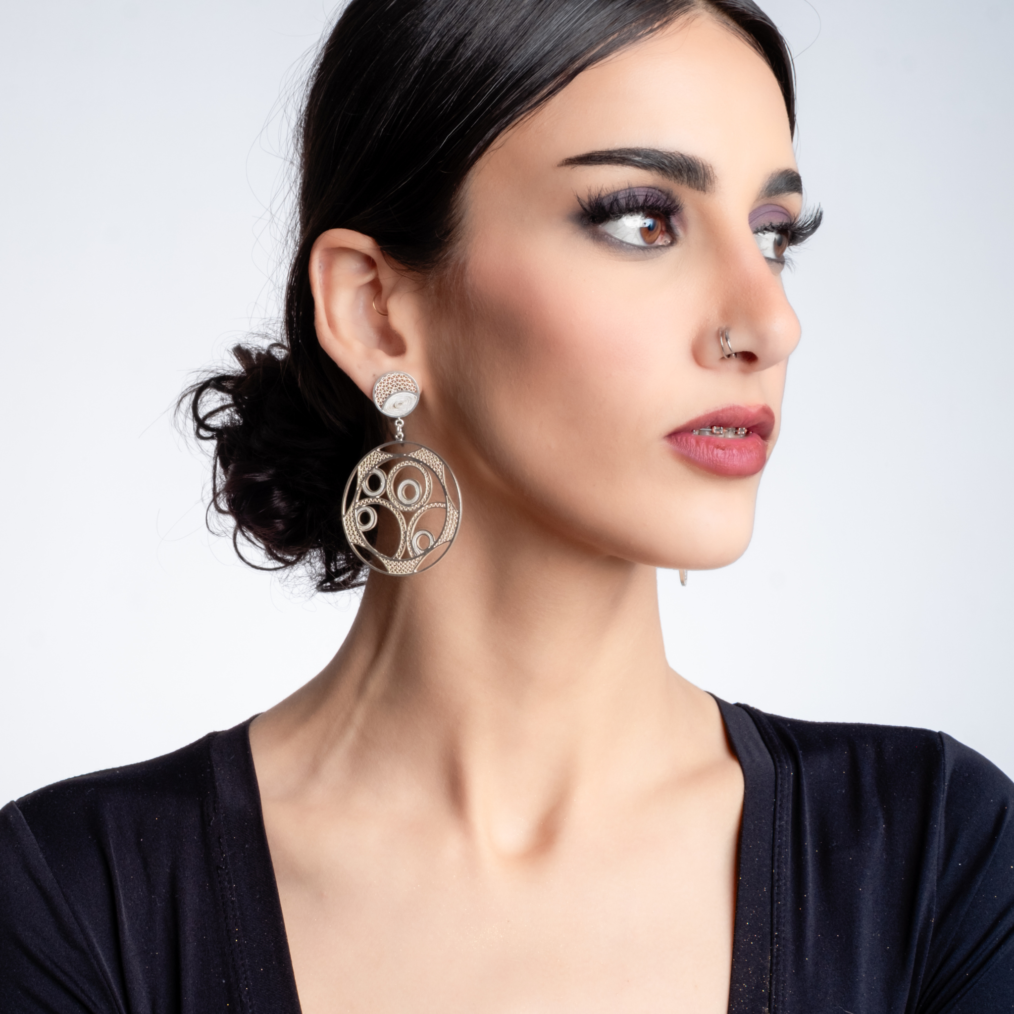 Woman wearing Luna, custom made MorphEar filigree earring by Valerosa