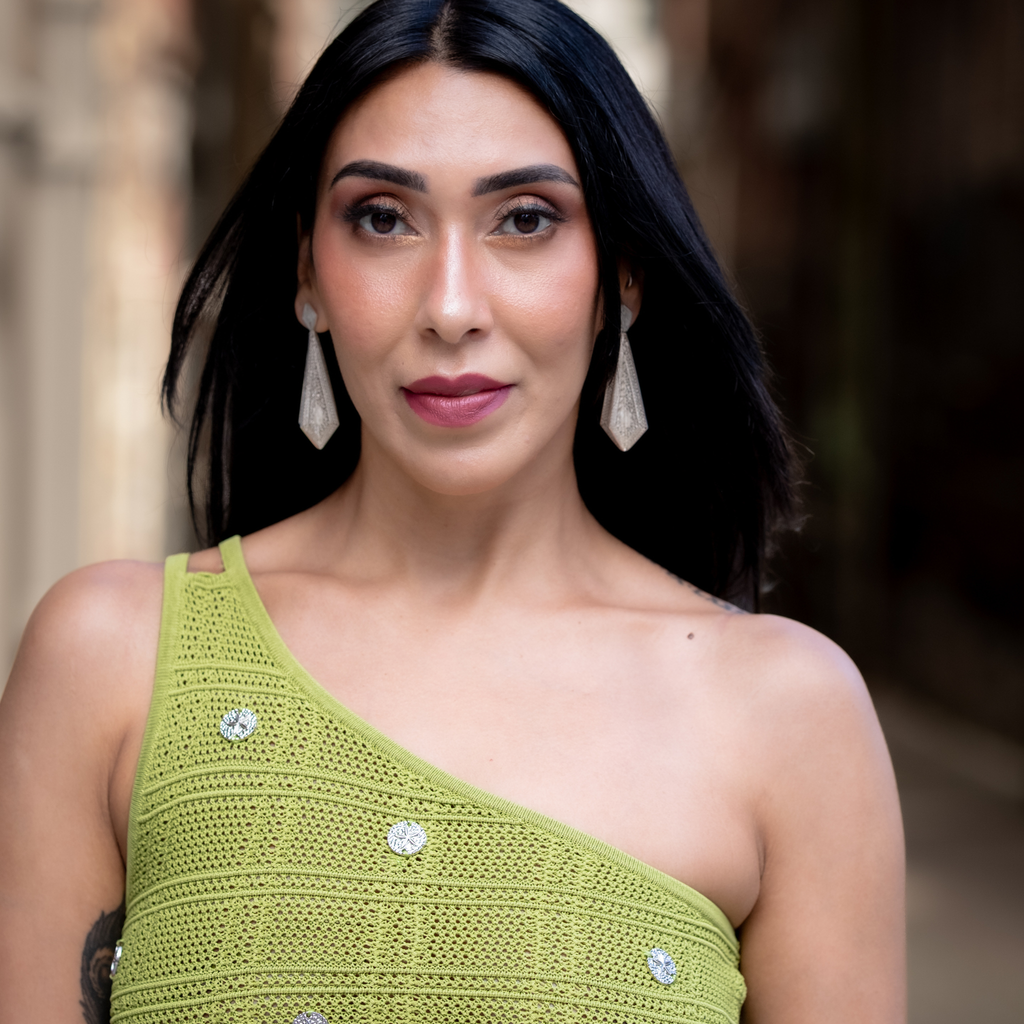 Woman wearing Rosario, handmade silver filigree convertible earrings by Valerosa
