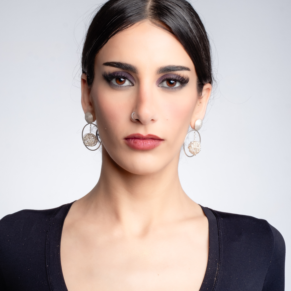 Woman wearing the versatile Aurora filigree MorphEar earrings by Valerosa. 
