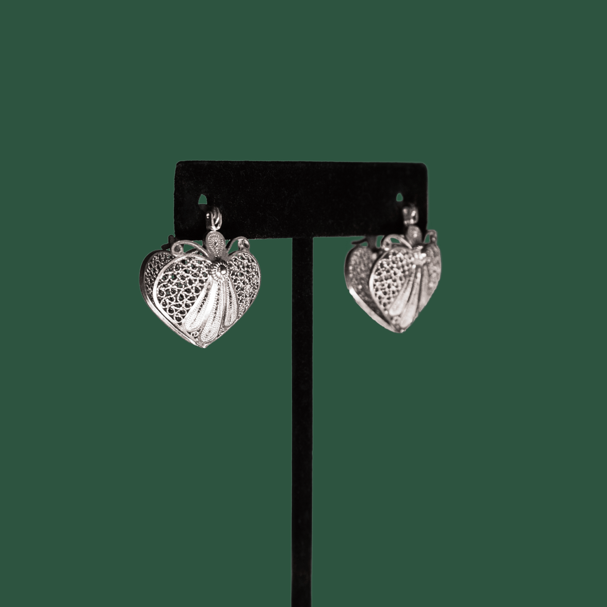 Amada, handmade silver filigree huggie earrings side profile

