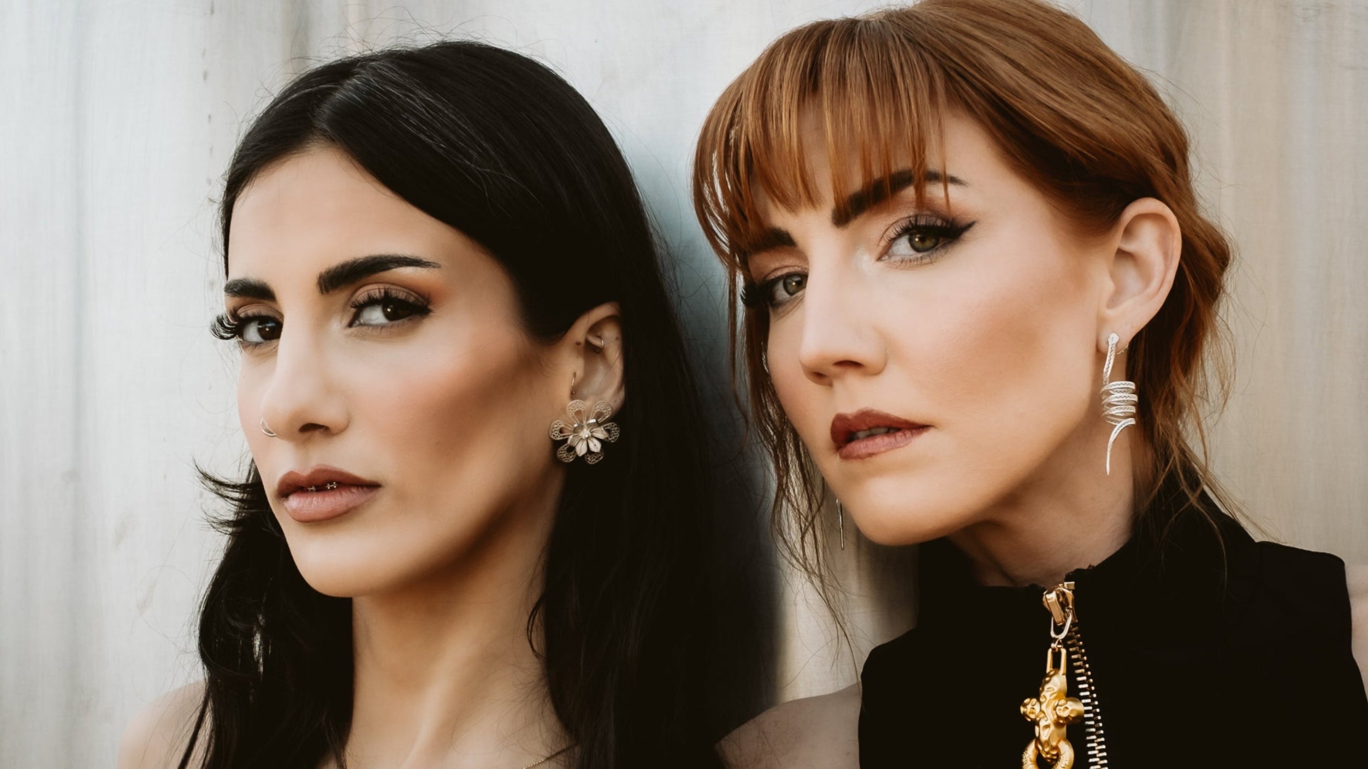 Woman wearing Arcadia and Prudencia MorphEar silver filigree earrings by Valerosa