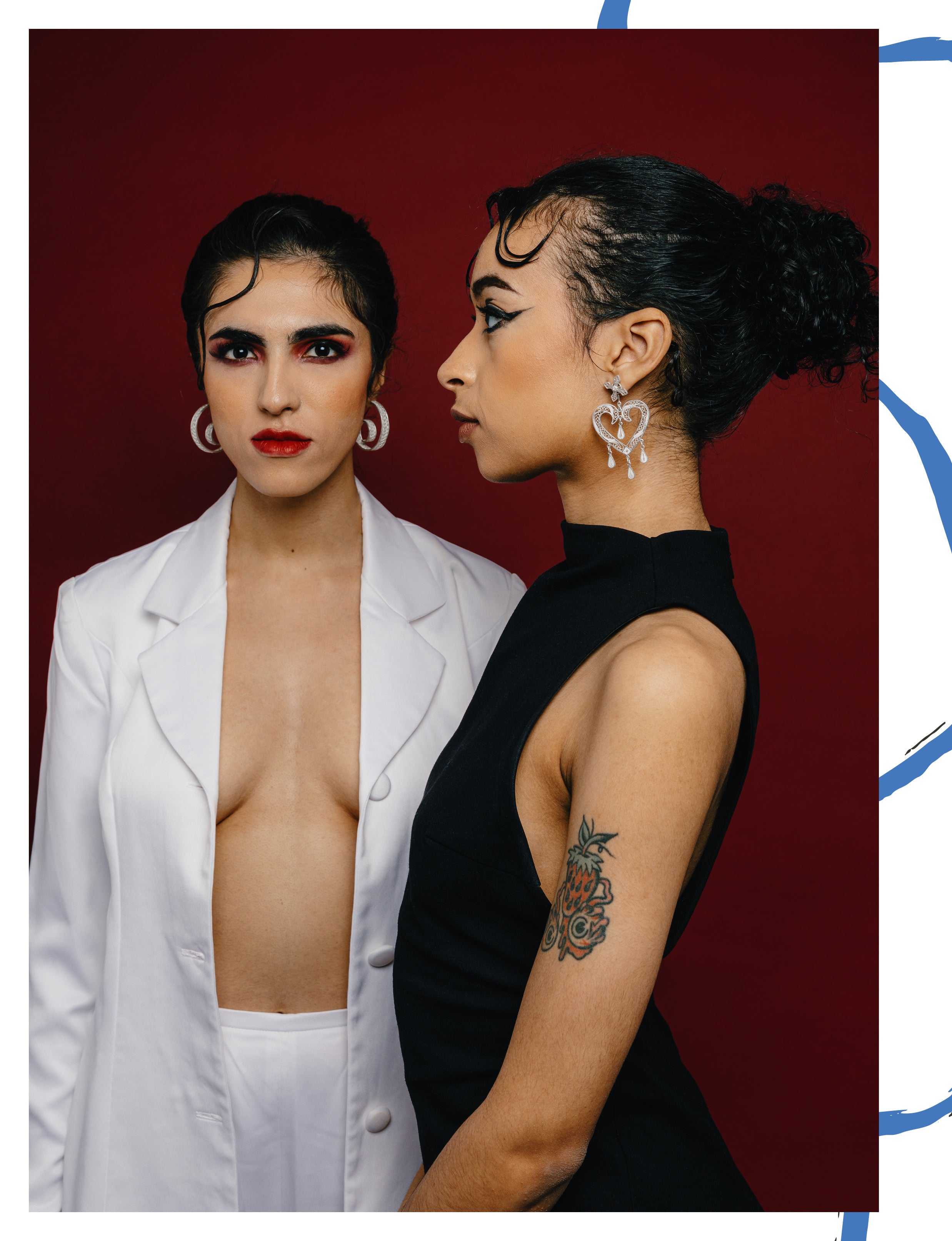 Models wearing Valerosa silver filigree MorphEar earrings on Malvie 
