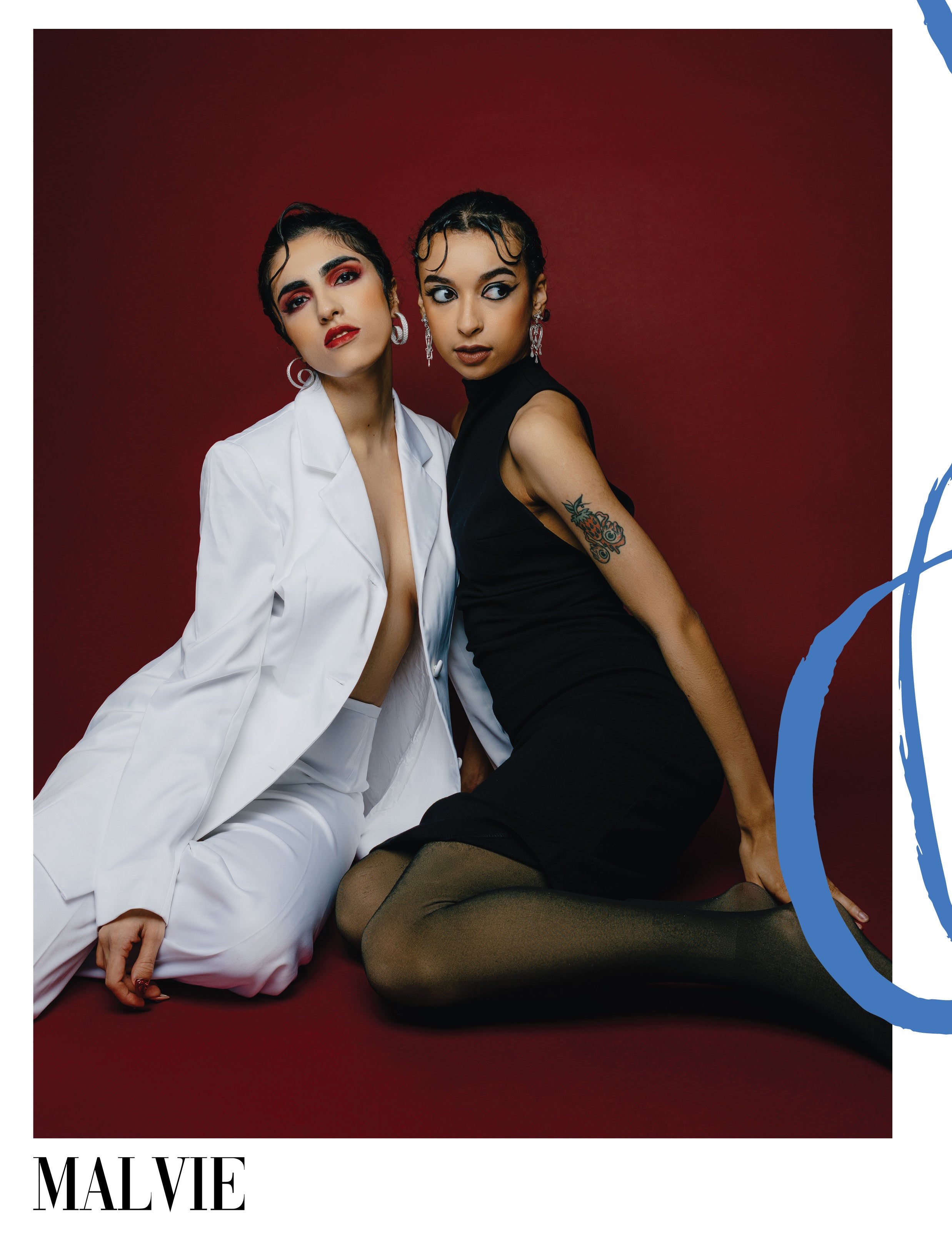 Models wearing Casta and Dolores MorphEar silver filigree earrings by Valerosa on Malvie