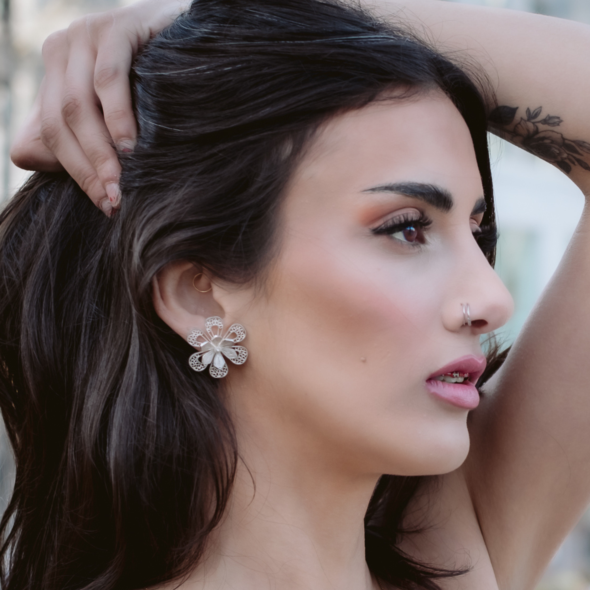 Woman wearing Prudencia, silver filigree convertible earrings