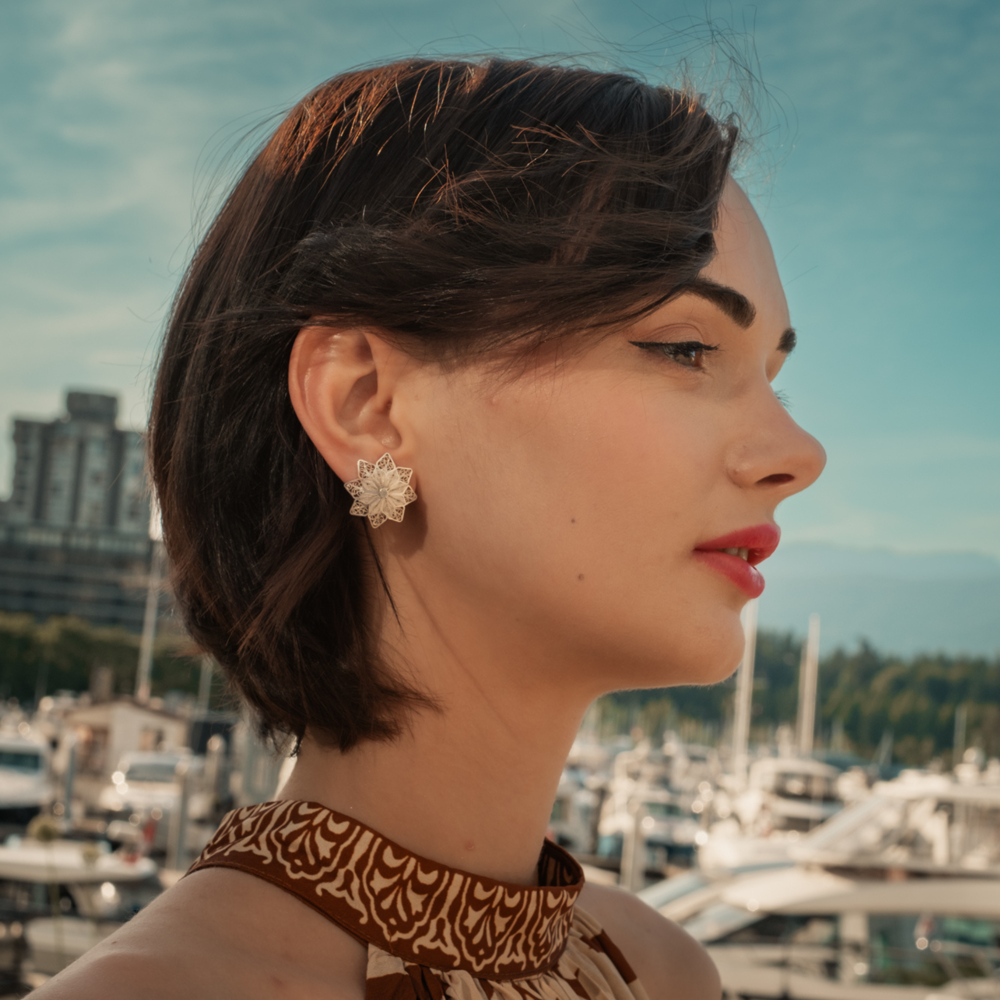Woman wearing Violeta, silver Filigree MorphEar earrings by Valerosa
