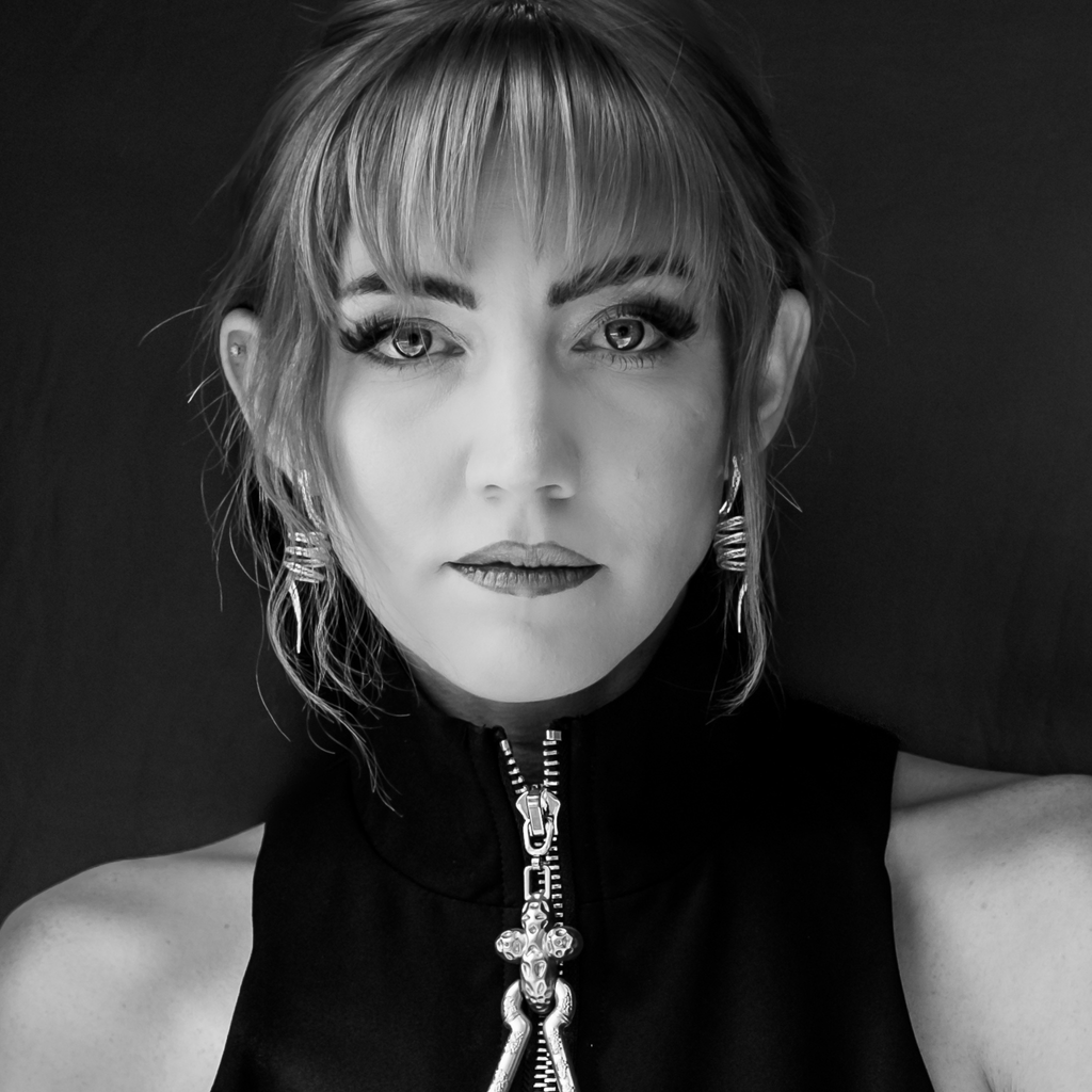Woman wearing Arcadia, custom made filigree earring by Valerosa